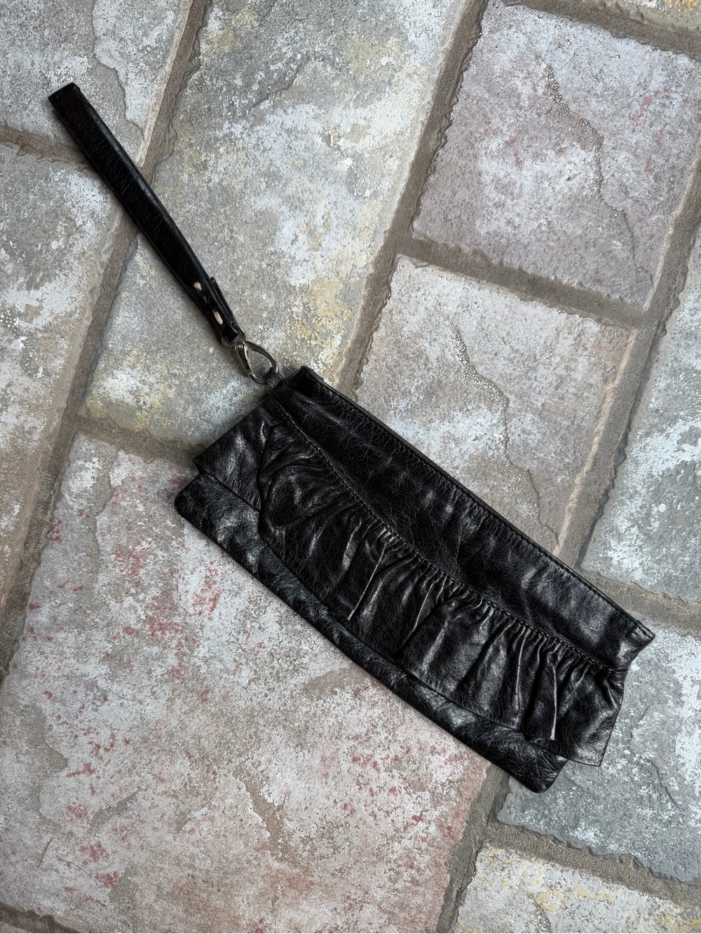 Y2K clutch with ruffled detailing and wrist strap